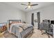 Cozy bedroom with a desk and gaming chair at 2298 Raven Ridge Rd, Minneola, FL 34715