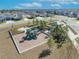 Community playground with playset and covered picnic area at 2298 Raven Ridge Rd, Minneola, FL 34715