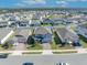 Aerial view of a house in a residential neighborhood at 2298 Raven Ridge Rd, Minneola, FL 34715