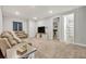 Comfortable living room with sectional sofa and TV at 2298 Raven Ridge Rd, Minneola, FL 34715