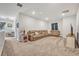 Spacious living area with sectional sofa and TV at 2298 Raven Ridge Rd, Minneola, FL 34715