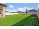 Large fenced backyard with lush green grass at 2298 Raven Ridge Rd, Minneola, FL 34715