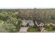 Aerial view of the house and surrounding neighborhood at 3721 Plantation Blvd, Leesburg, FL 34748