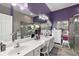 Elegant bathroom with double vanity and large shower at 3721 Plantation Blvd, Leesburg, FL 34748