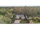 Aerial view of the house and surrounding neighborhood at 3721 Plantation Blvd, Leesburg, FL 34748