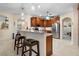 Spacious kitchen with an island and breakfast bar at 34932 Golden Tree Dr, Leesburg, FL 34788