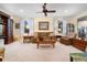 Comfortable living room with a sofa, chairs, and coffee table at 34932 Golden Tree Dr, Leesburg, FL 34788