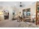 Bright and airy living room featuring a sofa and coffee table at 34932 Golden Tree Dr, Leesburg, FL 34788