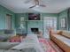 Living room features a fireplace, hardwood floors, and neutral color palette at 351 W 10Th Ave, Mount Dora, FL 32757