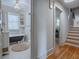 Bathroom with clawfoot tub, hexagon tile, and hallway view at 351 W 10Th Ave, Mount Dora, FL 32757