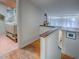 Modern bathroom with a stylish vanity and pink hexagonal tile floor at 351 W 10Th Ave, Mount Dora, FL 32757