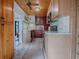 Updated kitchen with wood cabinets and marble countertops at 351 W 10Th Ave, Mount Dora, FL 32757
