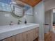 Modern bathroom with a floating vanity and hexagon tile floor at 351 W 10Th Ave, Mount Dora, FL 32757