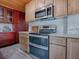 Updated kitchen with double oven, gas cooktop and stylish cabinetry at 351 W 10Th Ave, Mount Dora, FL 32757