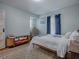 Bedroom with wood floors, dresser, and large window at 351 W 10Th Ave, Mount Dora, FL 32757