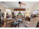Comfortable living room with hardwood floors and a cozy fireplace at 3646 Westover Cir, Leesburg, FL 34748