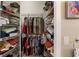 Walk-in closet with shelving and hanging rods at 3646 Westover Cir, Leesburg, FL 34748