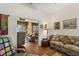 Living room with view into adjacent room at 3646 Westover Cir, Leesburg, FL 34748
