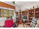 Gathering room with stained glass window and built-ins at 3646 Westover Cir, Leesburg, FL 34748