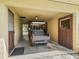 Garage with golf cart and additional storage at 36520 Micro Racetrack Rd, Fruitland Park, FL 34731