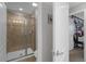 Clean bathroom with shower stall and neutral tile flooring at 4847 Clock Tower Dr, Kissimmee, FL 34746