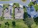 Three homes with similar architectural style and landscaping at 8913 Se 132Nd Loop, Summerfield, FL 34491