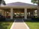 Outdoor community pavilion with picnic tables and ceiling fans at 8913 Se 132Nd Loop, Summerfield, FL 34491