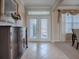 Elegant entryway with double doors and tile flooring at 8913 Se 132Nd Loop, Summerfield, FL 34491