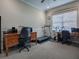 Home office with two work stations and exercise equipment at 8913 Se 132Nd Loop, Summerfield, FL 34491