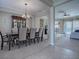 Bright dining room with view into living room and access to kitchen at 8913 Se 132Nd Loop, Summerfield, FL 34491