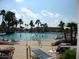 Relaxing community pool with plenty of lounge chairs at 8913 Se 132Nd Loop, Summerfield, FL 34491