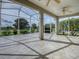Spacious screened lanai overlooking a golf course at 8913 Se 132Nd Loop, Summerfield, FL 34491