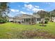 Screened pool and patio area, perfect for outdoor enjoyment at 1720 Park Forest Blvd, Mount Dora, FL 32757