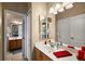 Bathroom with double sinks, vanity, and shower/tub combo at 1720 Park Forest Blvd, Mount Dora, FL 32757