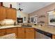 Kitchen features granite countertops and a large island at 1720 Park Forest Blvd, Mount Dora, FL 32757