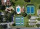 Aerial view of community pool and tennis courts at 1720 Park Forest Blvd, Mount Dora, FL 32757