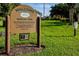 Community entrance sign with park rules and hours at 1720 Park Forest Blvd, Mount Dora, FL 32757