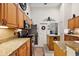 Kitchen boasts granite countertops and stainless steel appliances at 1720 Park Forest Blvd, Mount Dora, FL 32757