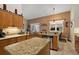Eat-in kitchen with granite countertops and stainless steel appliances at 1720 Park Forest Blvd, Mount Dora, FL 32757