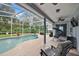 Spacious patio with pool views and seating area at 1720 Park Forest Blvd, Mount Dora, FL 32757
