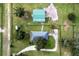 House and barn viewed from above, on a large property at 22722 Wolf Branch Rd, Sorrento, FL 32776