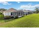 Aerial view showcasing the home's location and backyard at 24317 Amberleaf Ct, Leesburg, FL 34748