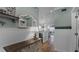 Entryway with a view into living room and kitchen area at 450 Bouchelle Dr # 301, New Smyrna Beach, FL 32169