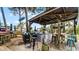 Community outdoor kitchen with grill and seating at 450 Bouchelle Dr # 301, New Smyrna Beach, FL 32169