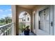 Inviting condo entryway with private balcony and view of lush landscaping at 450 Bouchelle Dr # 301, New Smyrna Beach, FL 32169
