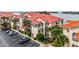 Multi-unit building with red tile roofs and waterfront views at 450 Bouchelle Dr # 301, New Smyrna Beach, FL 32169