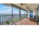 Relaxing balcony overlooking waterfront at 450 Bouchelle Dr # 301, New Smyrna Beach, FL 32169