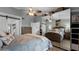 Bright bedroom with mirrored closet and coastal decor at 450 Bouchelle Dr # 301, New Smyrna Beach, FL 32169