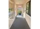 Exterior hallway with access to unit and parking at 450 Bouchelle Dr # 301, New Smyrna Beach, FL 32169