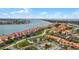 Aerial view of community with tennis courts at 450 Bouchelle Dr # 301, New Smyrna Beach, FL 32169